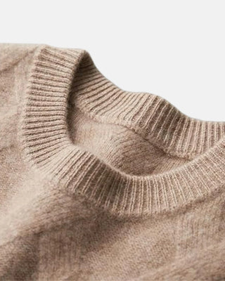 Pull torsadé col rond